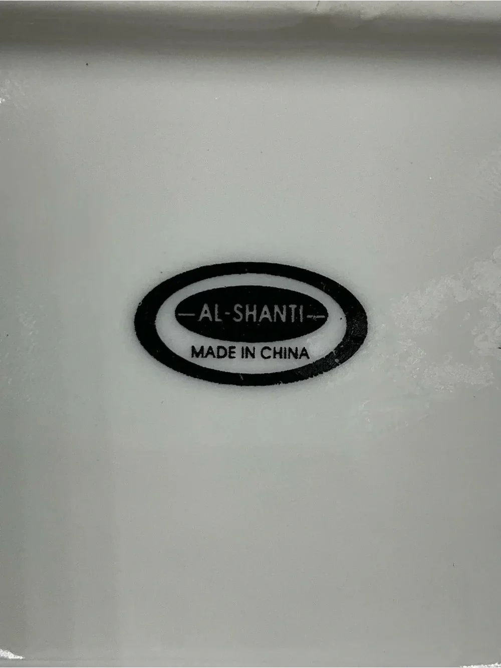 Al-Shanti White Ceramic Plate with Black Logo